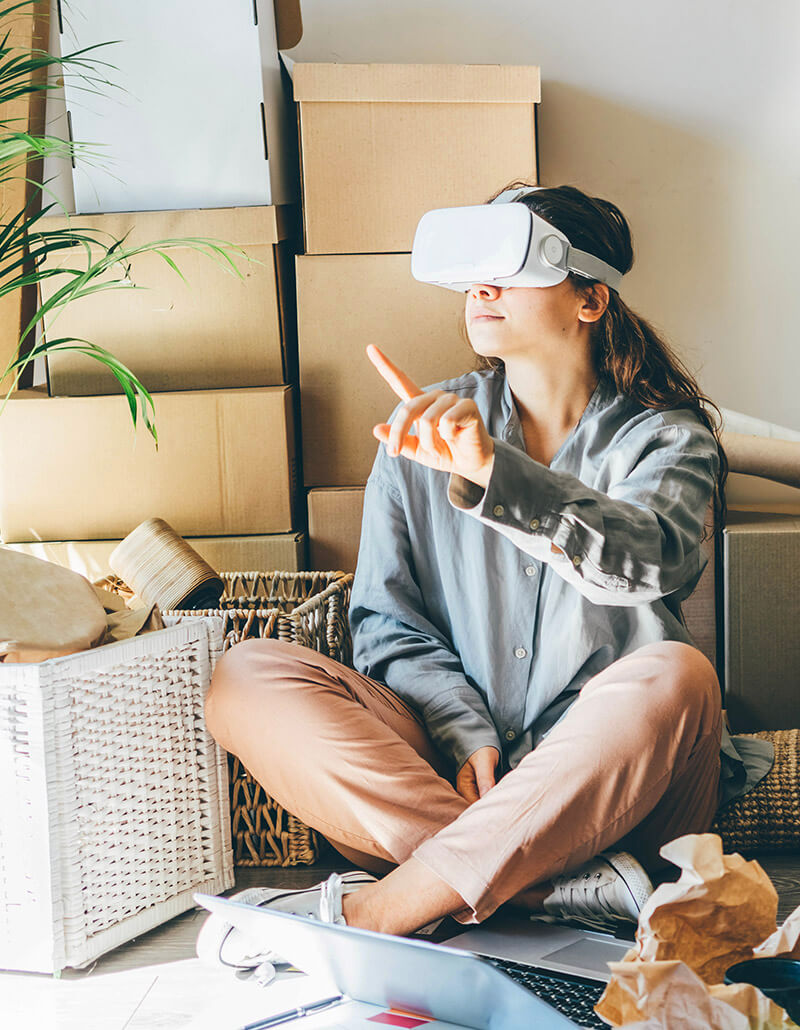 Young Woman Exploring Home in Virtual Reality